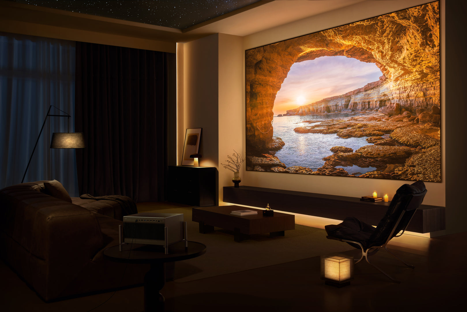 XGIMI Titan Noir projector displaying a vivid movie on a NothingProjector ALR screen in a softly lit living room.